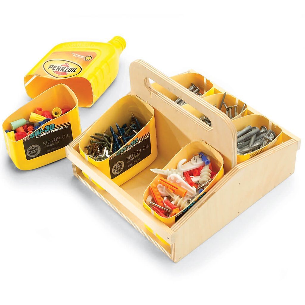 A wooden box with compartments for fishing rods and lures.