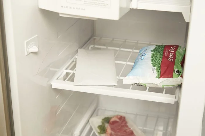 A refrigerator with some food in it