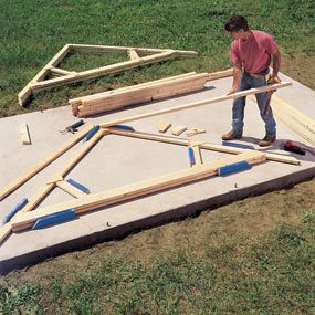 A man standing on top of a cement slab.